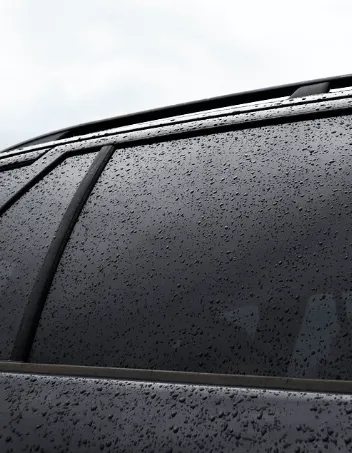 Rain drops on window with NEXseries window tint